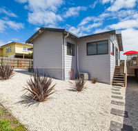 Bircoo Cottage Beach and Golf Getaway - Australia Accommodation