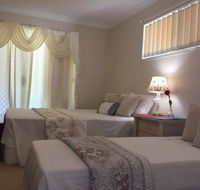 Theme Parks Amituofo Guest House - Australia Accommodation