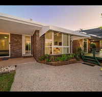 Woorim Secluded Palms Cottage - Australia Accommodation