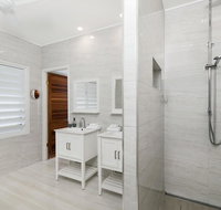 Bathers across the bay from Port Douglas - Australia Accommodation