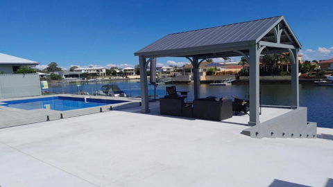 Relax Poolside By The Canal - Australia Accommodation 1